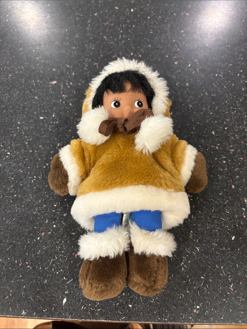 Precious Indigenous doll in coat and boots
